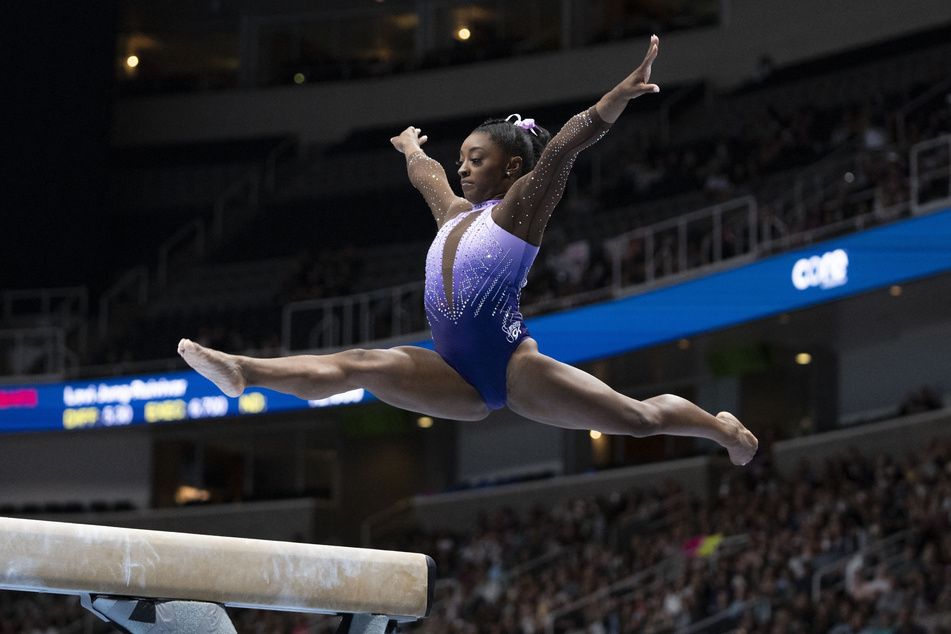 Simone Biles performs on the balance beam during the 2023 US Gymnastics Championships at SAP Center.