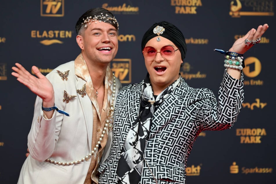 Julian F.M. Stoeckel (r.) und sein Partner Marcell Damaschke (30) können nach einem Brand vorerst nicht in ihre Wohnung zurückkehren.