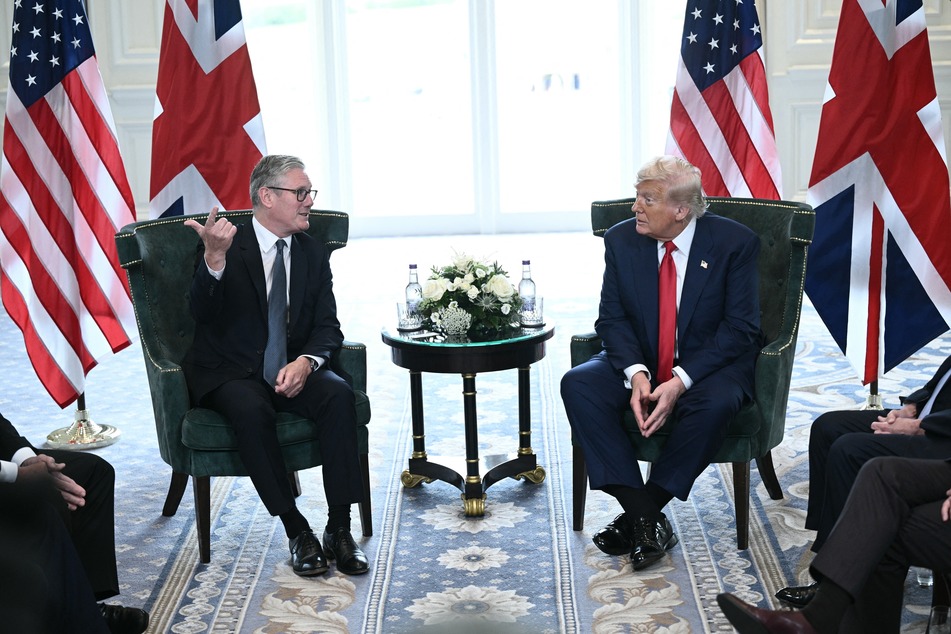 Britain's Prime Minister Keir Starmer (L) talks with US President Donald Trump (R) during a bilateral meeting at the Trump Turnberry Golf Courses, in Turnberry south west Scotland on Monday.