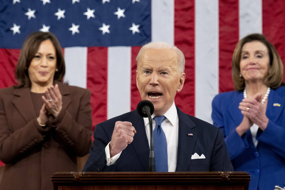 President Joe Biden delivering his State of the Union address, with VP Kamala Harris (l.) and House Speaker Nancy Pelosi in the background.