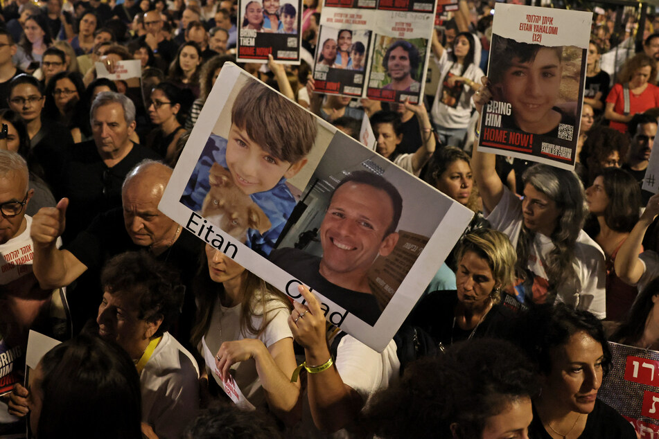 Israelis attend a rally calling for the release of hostages abducted by Palestinian militants during the October 7 attack and currently held in the Gaza Strip, in Tel Aviv on November 4, 2023.