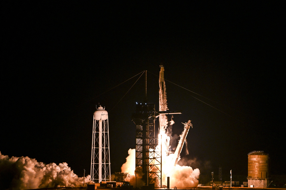 A SpaceX Falcon 9 rocket with the Crew Dragon Resilience capsule, carrying the crew of the Polaris Dawn Mission, lifts off from Launch Complex 39A at Kennedy Space Center in Cape Canaveral, Florida, on Tuesday.