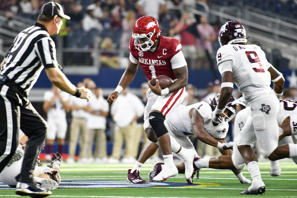 Arkansas quarterback KJ Jefferson (c.) fought through injury to lead his team to a big win over Texas A&amp;M on Saturday.