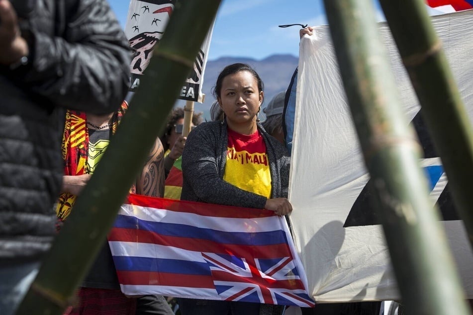 Hawaiian nationals gather to protest the construction of a massive telescope on the sacred mountain of Mauna Kea.