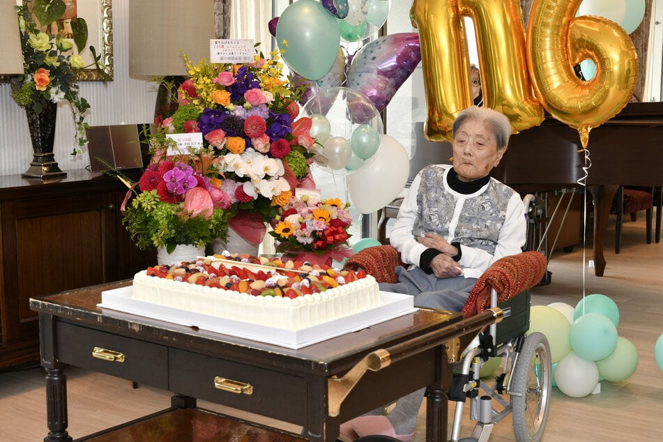 This handout file photo taken on May 23, 2024 and provided to AFP on August 22, 2024 by the Ashiya City government shows Japanese woman Tomiko Itooka as she celebrates her 116th birthday, in the city of Ashiya, Hyogo prefecture.