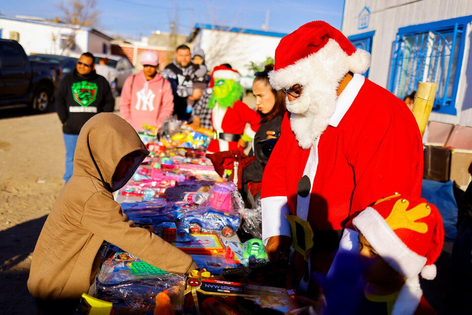 Children were visited by Santa Claus in Ciudad Juárez, Mexico, as they wait for their asylum claims to be processed.