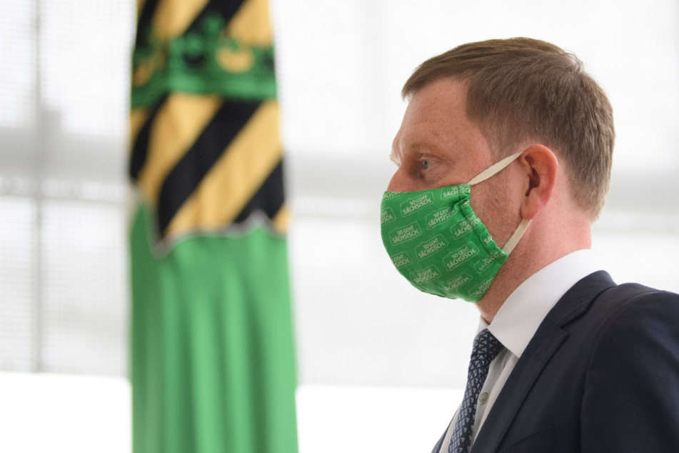 Michael Kretschmer (45, CDU).