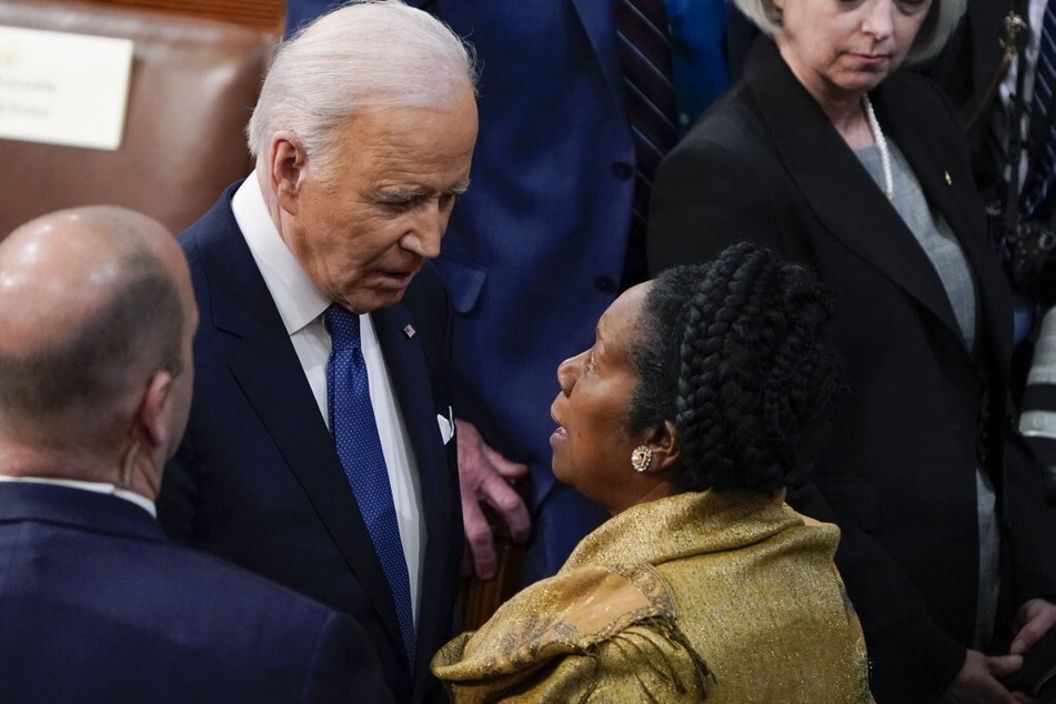 President Joe Biden speaks with Rep. Sheila Jackson Lee after delivering his State of the Union address at the US Capitol on March 1, 2022.