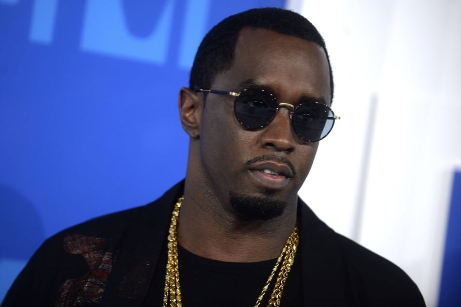 Diddy will face more time behind bars after allegedly getting caught drinking alcohol and making an unauthorized three-way call in prison.