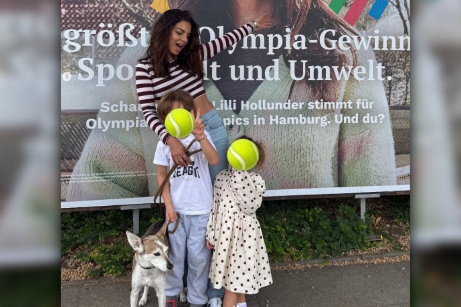 Lilli Hollunder (40) mit ihren beiden Kindern und Hündin Momo.