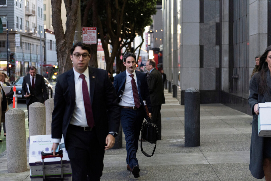 Documents being brought to the federal court in San Francisco, California, where the securities fraud trial is taking place.
