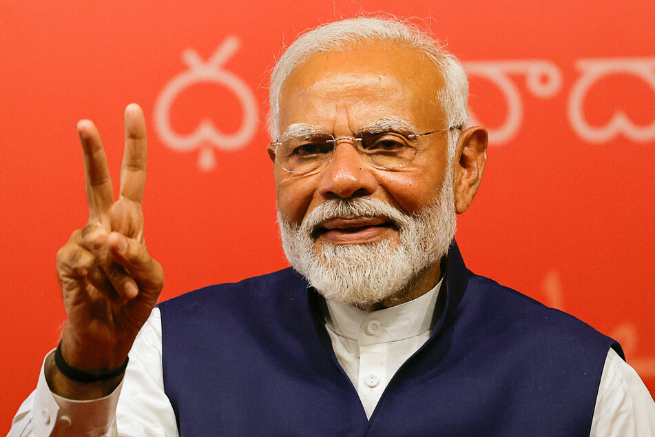 Indian Prime Minister Narendra Modi gestures, at the Bharatiya Janata Party headquarters in New Delhi.