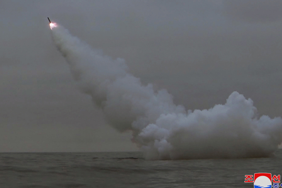 North Korea raises temperature with submarine missile launch