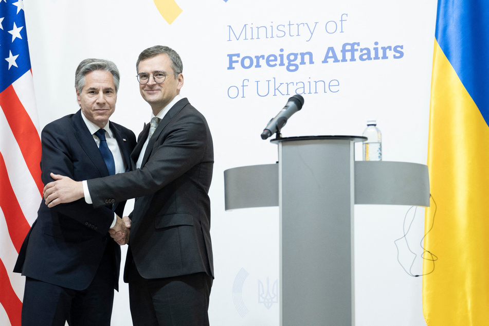 Ukraine's Foreign Minister Dmytro Kuleba (r.) and US Secretary of State Antony Blinken (l.) embrace during a joint press conference in Kyiv on May 15, 2024.