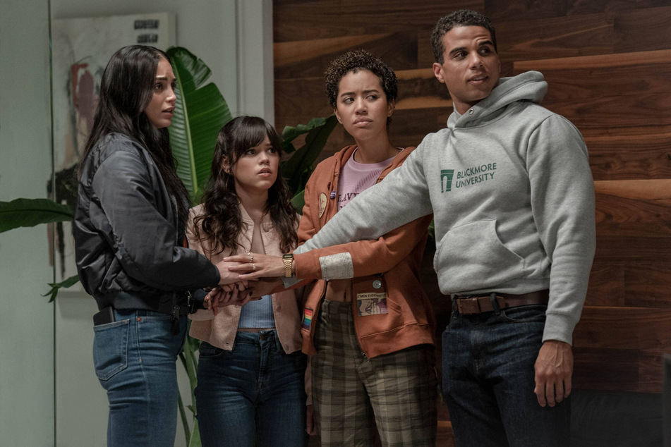 From l. to r.: Melissa Barrera, Jenna Ortega, Jasmin Savoy Brown, and Mason Gooding deliver stunning performances as the "core four" in Scream VI.
