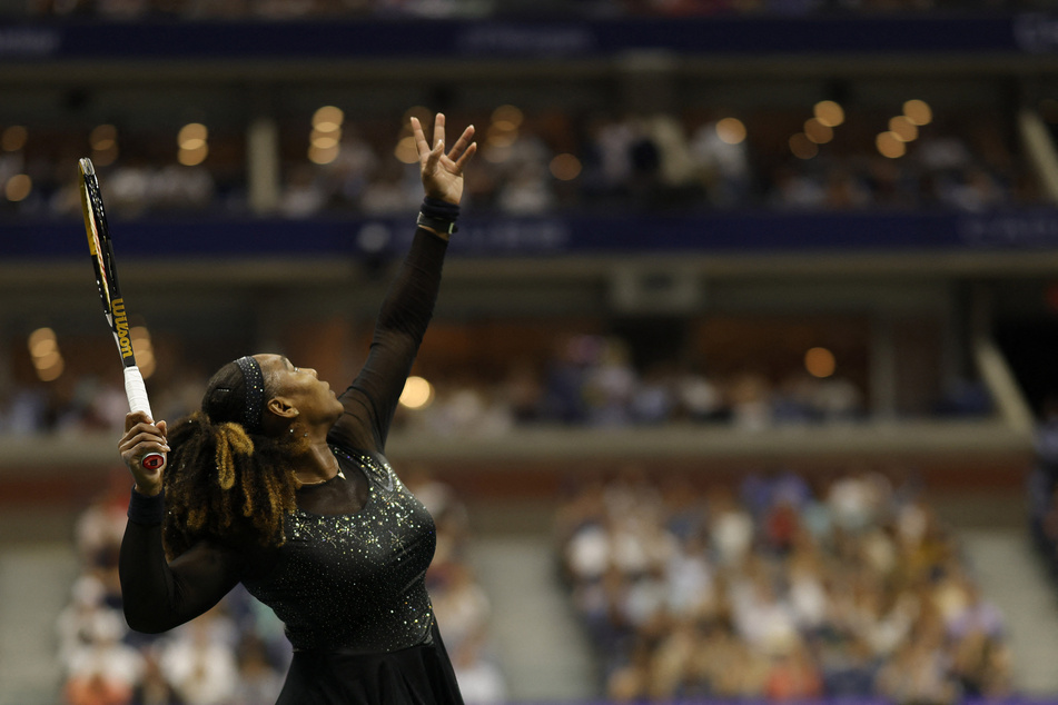 Serena Williams serves the ball against Anett Kontaveit on day three of the 2022 US Open.