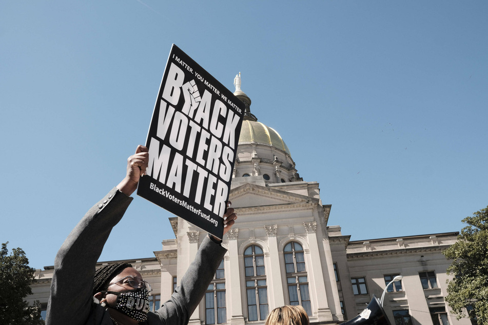 Protesters gathered outside the Georgia Capitol after the passage of a suppressive voting law which disproportionately impacts Black and brown voters.