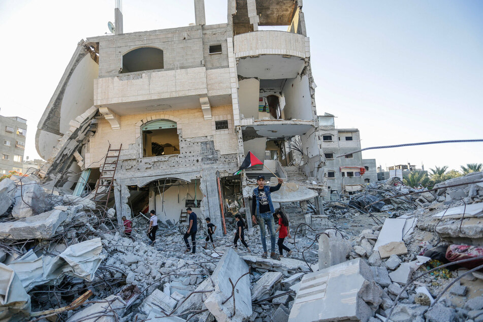 Israeli airstrikes hit Gaza after Palestinians protested the nationalist Flag March celebrating the occupation of East Jerusalem.