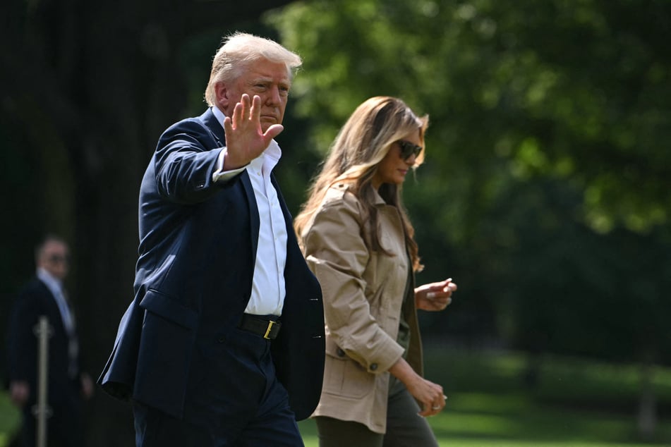 President Donald Trump (l.) praised his wife, Melania, for speaking out on the Ukraine war's toll on children.