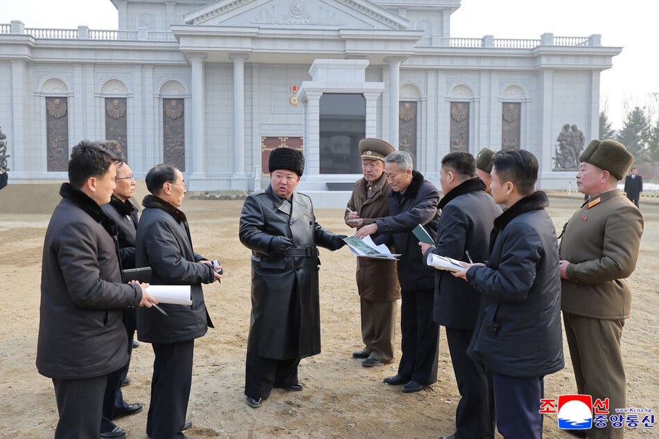North Korean leader Kim Jong Un (c.) pictured in February inspecting the under-construction Memorial Museum of Combat Feats, which honors his country's soldiers fighting in Russia's war on Ukraine.