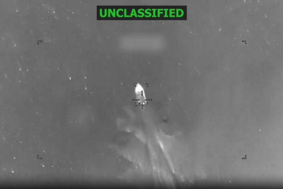 This screen grab from a video posted on the X account of US Southern Command on May 5, 2026, shows a vessel that was struck by US forces in the eastern Pacific.