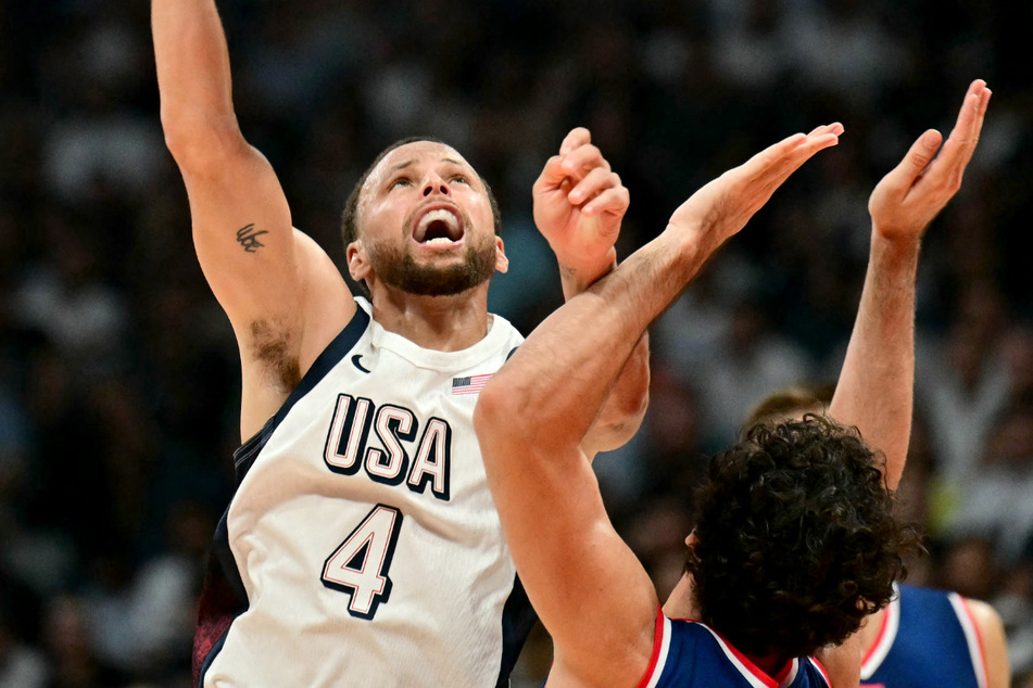 Stephen Curry, who scored just three points in the USA's 98-92 win over the Boomers, caught fire on Wednesday.