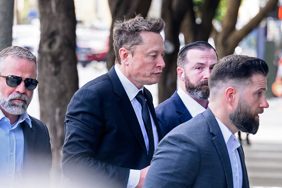 Elon Musk arrives at federal court in San Francisco, California, on March 4, 2026, during his trial in a civil case for allegedly manipulating Twitter's stock price prior to his purchase of the company in 2022.