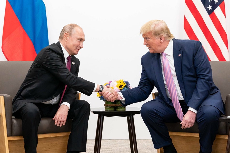 Donald Trump shakes hands with Russian president Vladimir Putin during a bilateral meeting in June 2019.