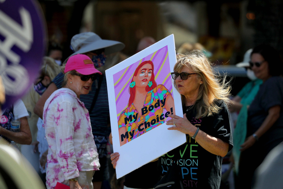 Floridians rally to protest bills that would restrict a woman's right to choose.