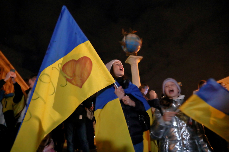 Residents celebrated in Kyiv, Ukraine on Friday after Russia's retreat from Kherson.