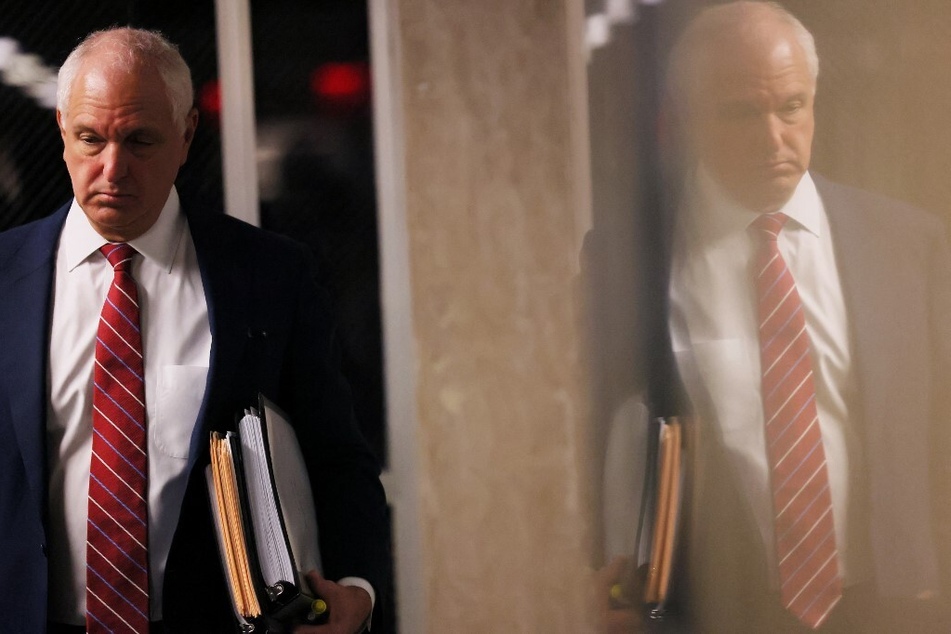 Trump Organization Attorney Alan Futerfas waits to enter the courtroom after a lunch recess during a trial at the New York Supreme Court on November 17, 2022.