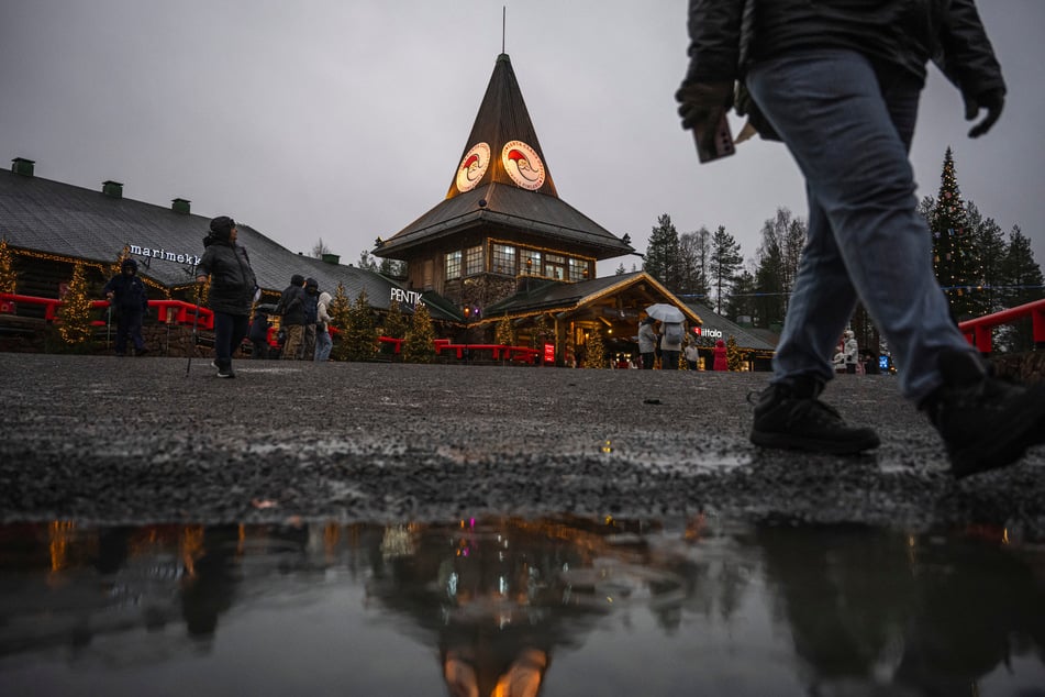 With a month to go until Christmas, Santa Claus is busy preparing, but the warming climate and lack of snow in his Arctic hometown have him worried.