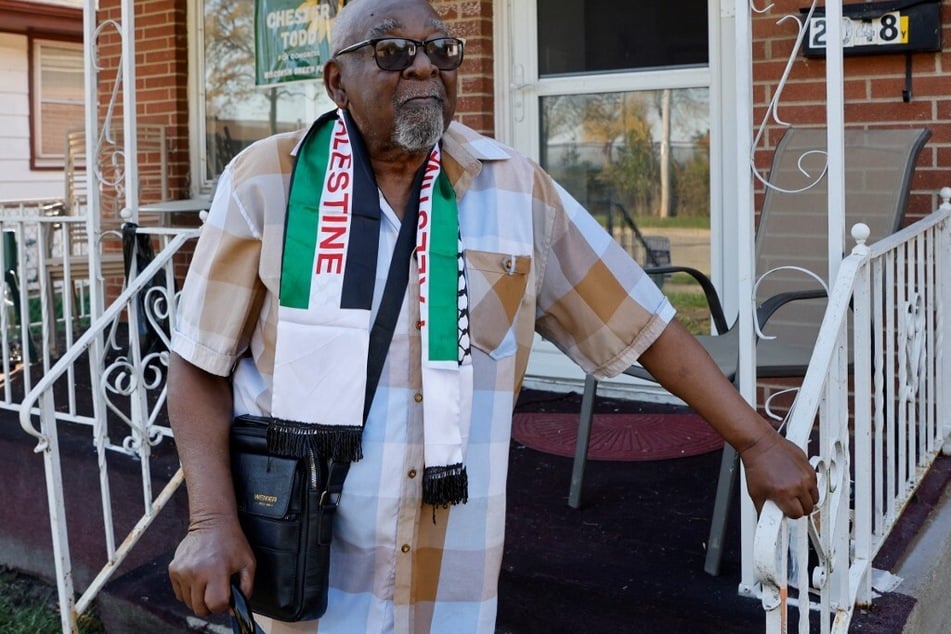 Chester Todd stands outside his home in Racine, Wisconsin.