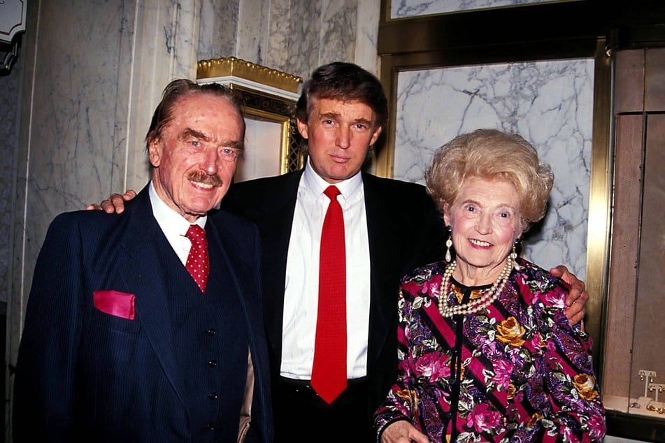 Fred Trump (l.) and his wife, Mary Anne MacLeod Trump (r.), pose with their son Donald in a photograph from 1992.