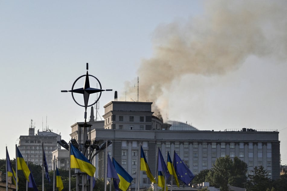 Smoke rises over the government headquarters in Kyiv, following Russian drone and missile strikes on September 7, 2025.