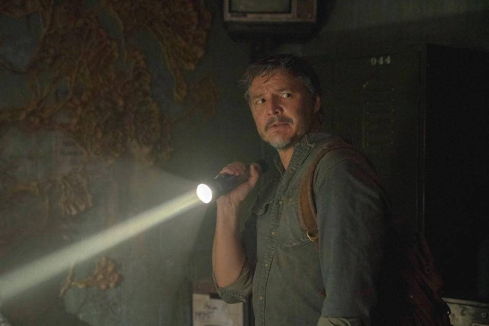 Pedro Pascal plays Joel, a smuggler tasked with escorting the teenage Ellie across a post-apocalyptic US in HBO Max's The Last of Us.