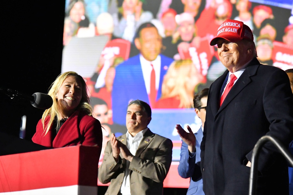 Marjorie Taylor Greene (l.) attending Donald Trump's rally in Commerce, Georgia, in March 2022.