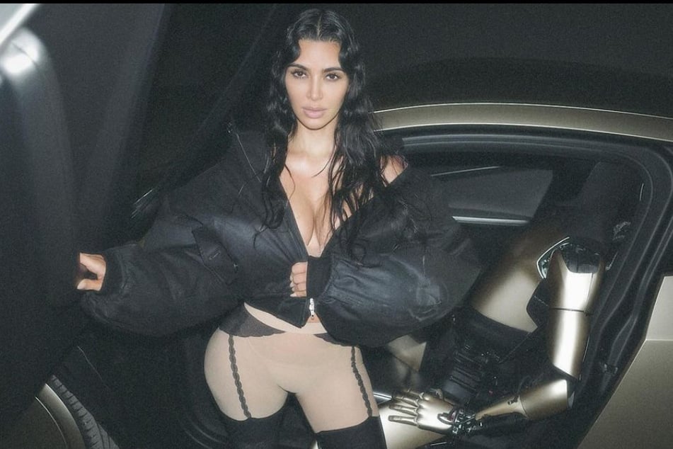 Kim Kardashian gave a sultry look at her new robot pal which has led to severe backlash from fans.