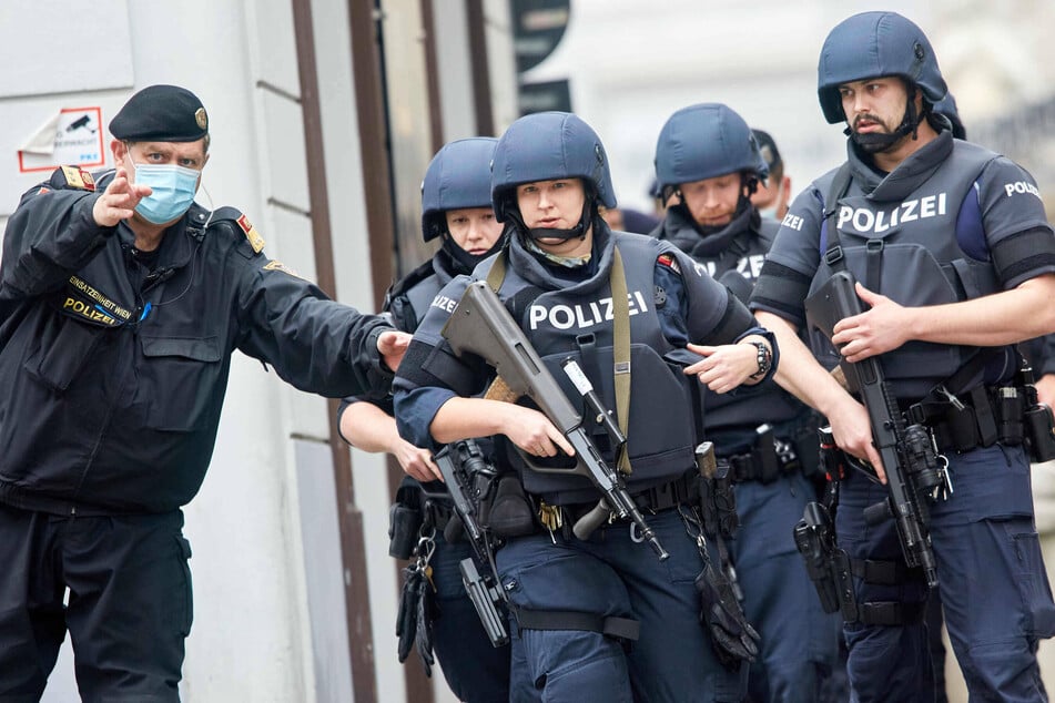 Austrian police at the scene of the attack in the Vienna city center.