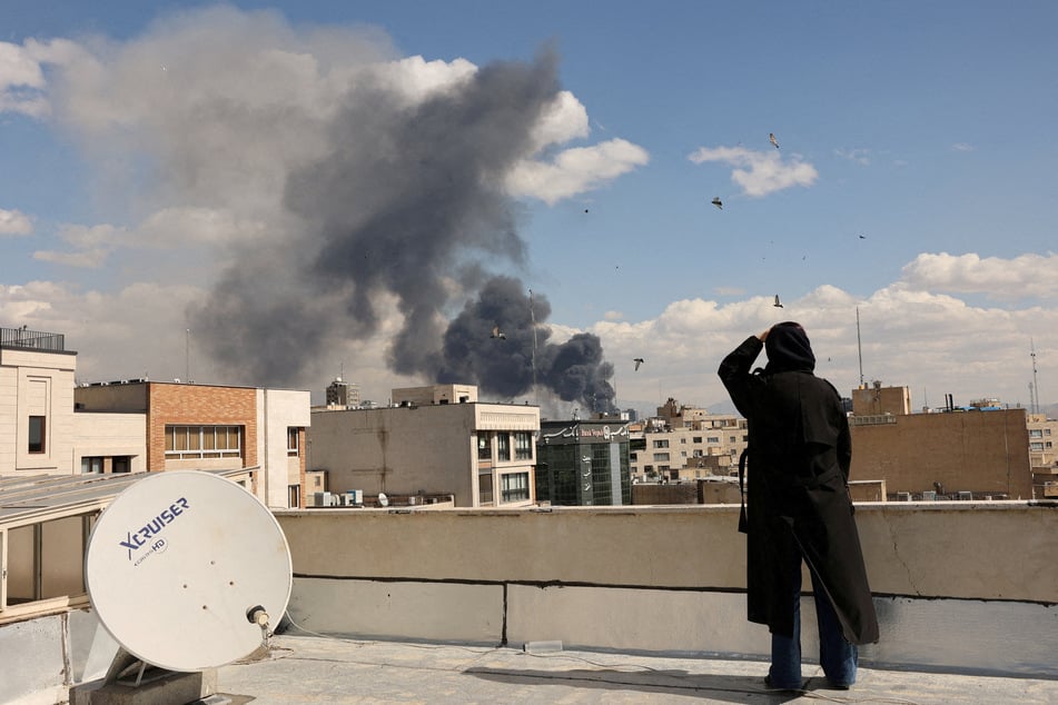 Smoke rises following an explosion in Tehran on March 1, 2026, after Israel and the US launched strikes on Iran.