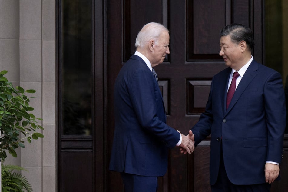 Biden and Xi vow to reduce tensions as key summit talks begin