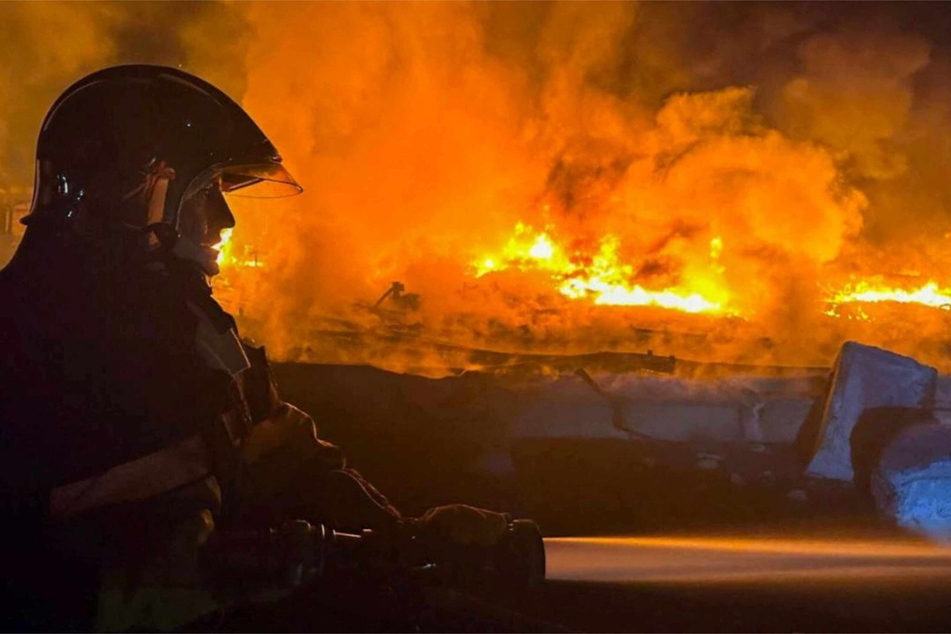 A firefighter at a site hit during Russia's drone attacks in the Odesa region of Ukraine on Sunday.