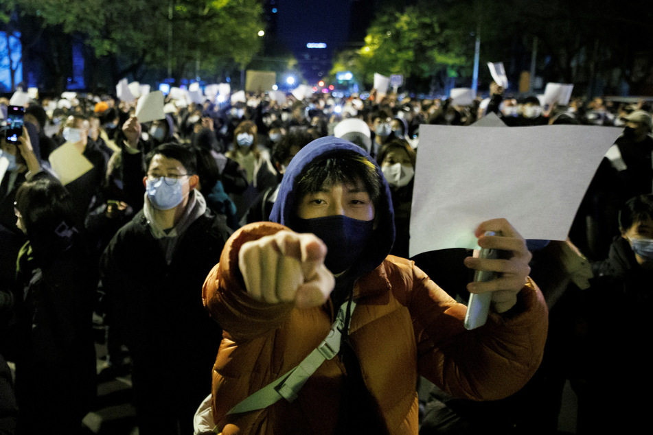 Protesters in China held up blank sheets of paper in reference to the strict censorship laws.