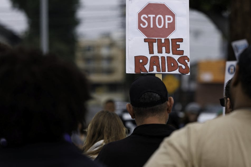 Demonstrators rally against Donald Trump's anti-immigration ICE raids in Culver City, California.