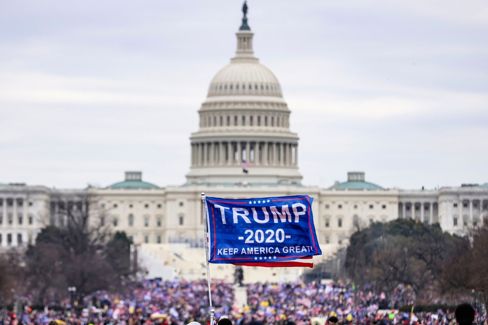 Pro-Donald Trump supporters storming the US Capitol following the Stop the Steal rally in Washington DC on January 6, 2021.