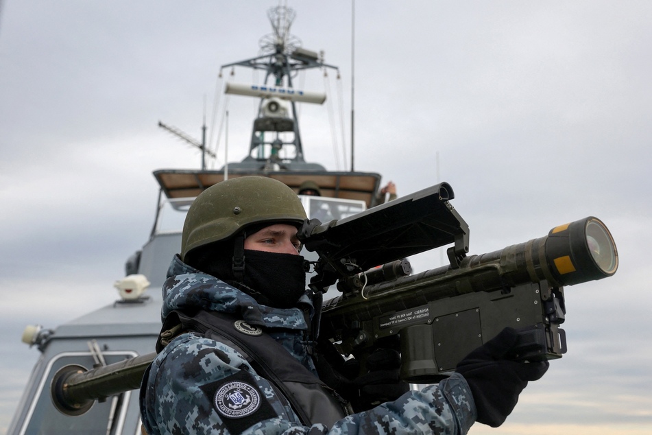 Ukrainian serviceman holds a MANPADS (Man-Portable Air-Defense Systems) Stinger anti-aircraft weapon as they scan for possible air targets onboard a Maritime Guard of the State Border Service of Ukraine boat as it patrols in the northwestern part of the Black Sea on December 18, 2023.
