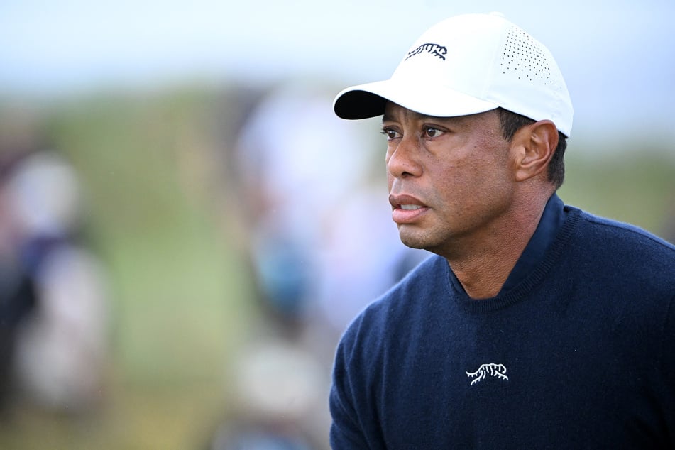 Tiger Woods said Tuesday he has a "long way to go" in his bid to compete against the world's best golfers as he continues to recover from his latest pain-relieving back surgery in September.