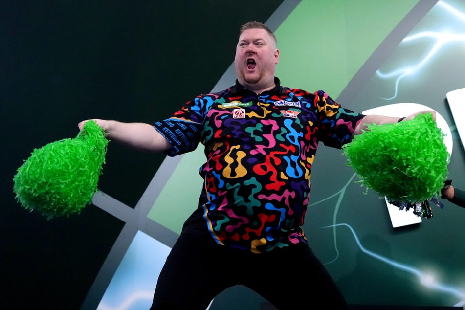 Ricky Evans (35, im Bild) unterlag seinem Landsmann Charlie Manby (20) in der dritten Runde der Darts-WM. Danach regnete es Hasskommentare.