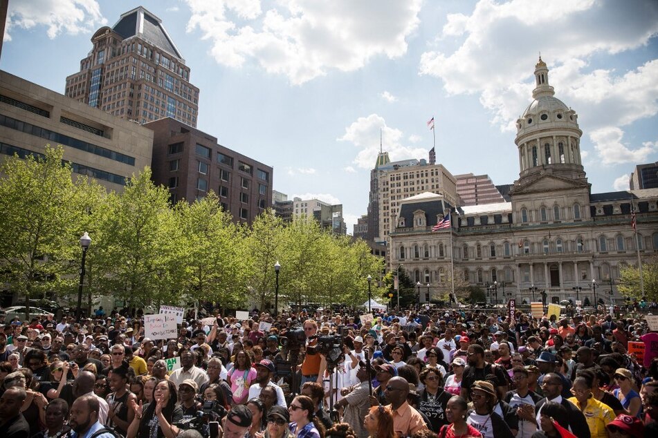 Protesters rally in front of Baltimore City Hall following the police killing of Freddie Gray in May 2015.