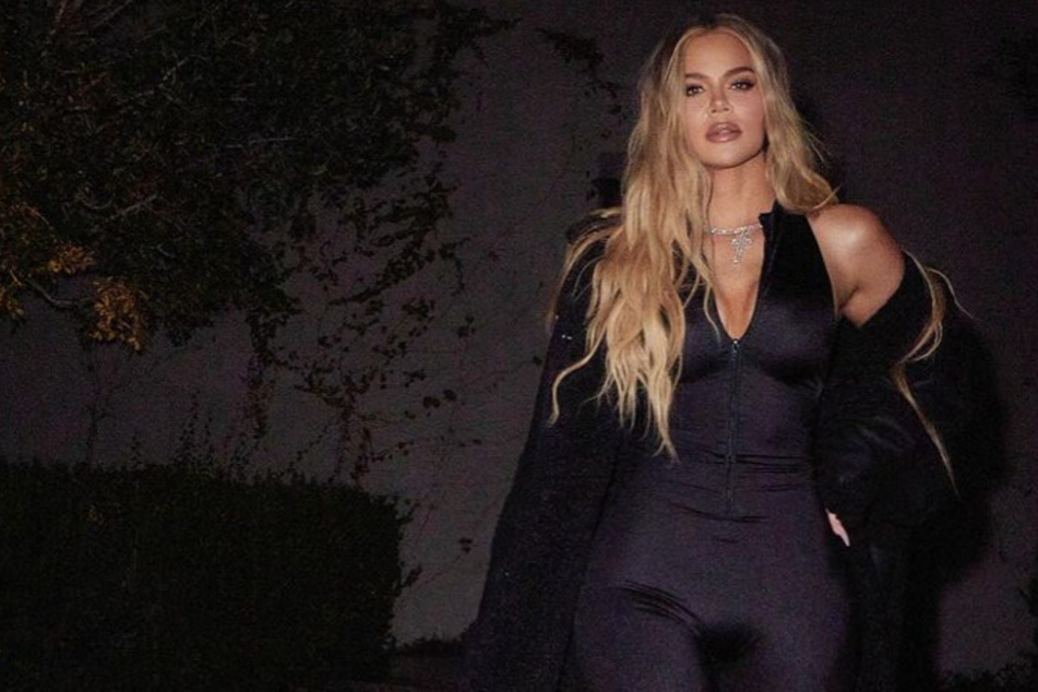 Khloé Kardashian's latest Instagram caption raised some eyebrows as she confessed to wanting to "slap someone" under a photo of herself in a SKIMs jumpsuit.